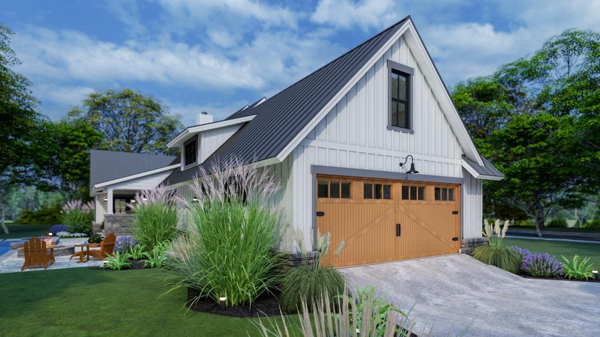A modern farmhouse with a wooden garage door is surrounded by lush green landscaping, including a pool and seating area in the backyard.
