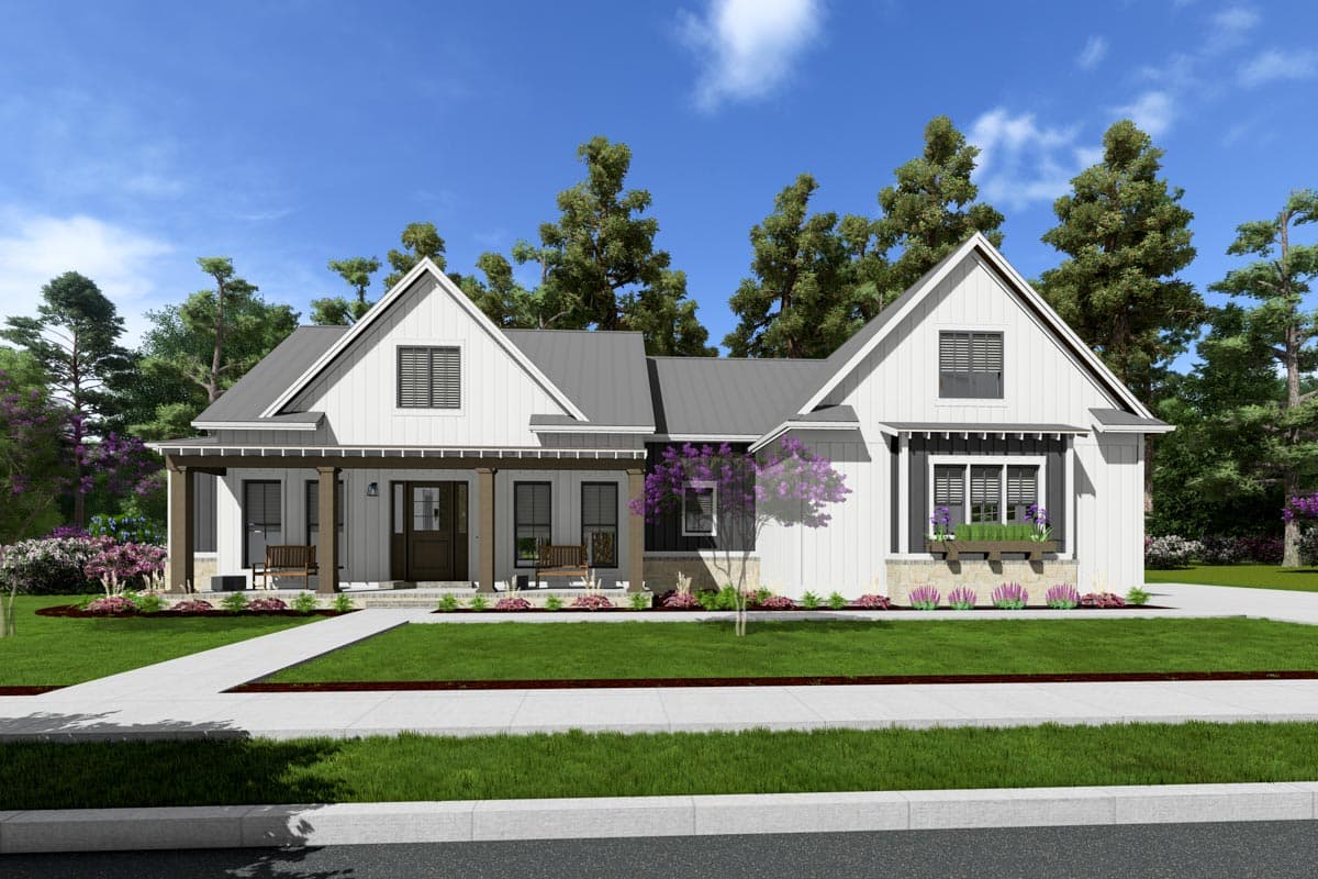 House plan exterior. Modern Farmhouse style with two gables, covered porch supported by columns, and a dark metal roof. Two-story structure.