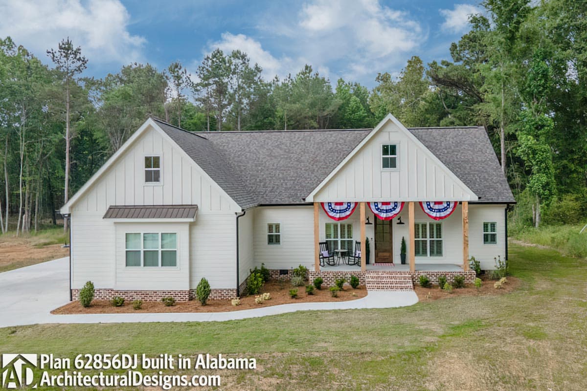 House plan exterior of a white Modern Farmhouse with a covered front porch, gables, and board and batten siding.