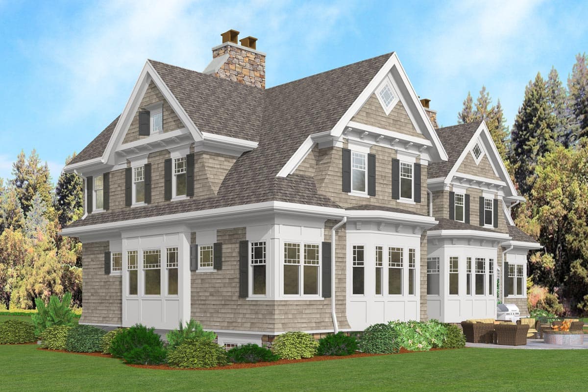 House plan exterior: Two-story home with gabled dormers, stone chimney, bay windows, and shaker siding.