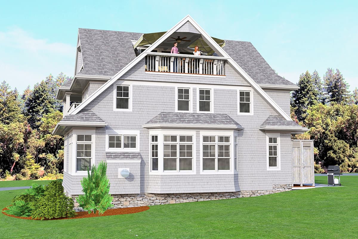 House plan exterior: gray shingle siding, multiple gables, bay window, and upper-level balcony with seating.