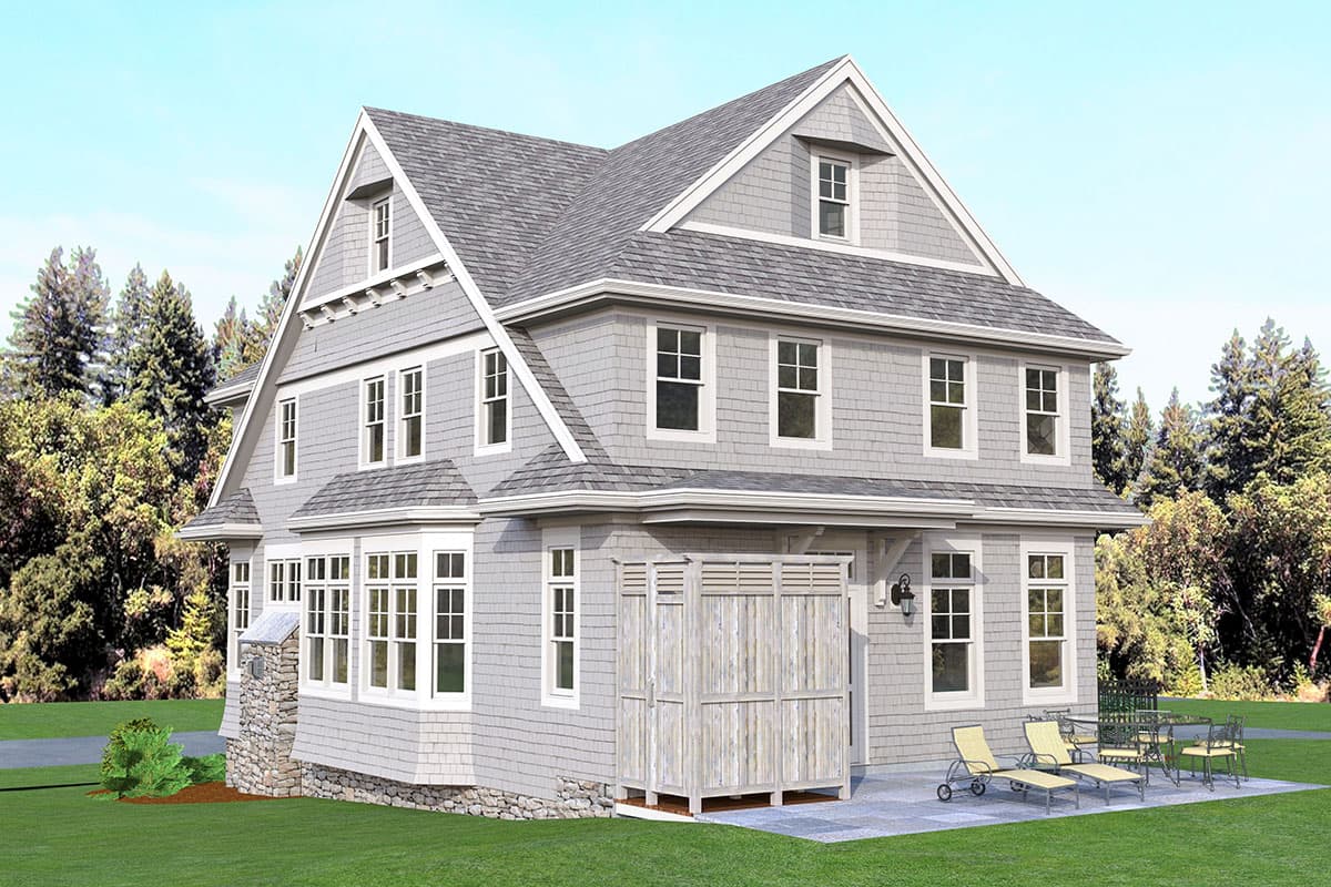 House plan exterior: Two-story shingled home with multiple gables, bay windows, dormers, and stone foundation.