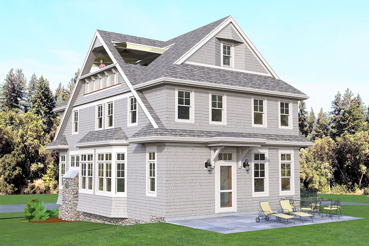House plan exterior with gray shingle siding, multiple gables, dormers, and a prominent bay window.