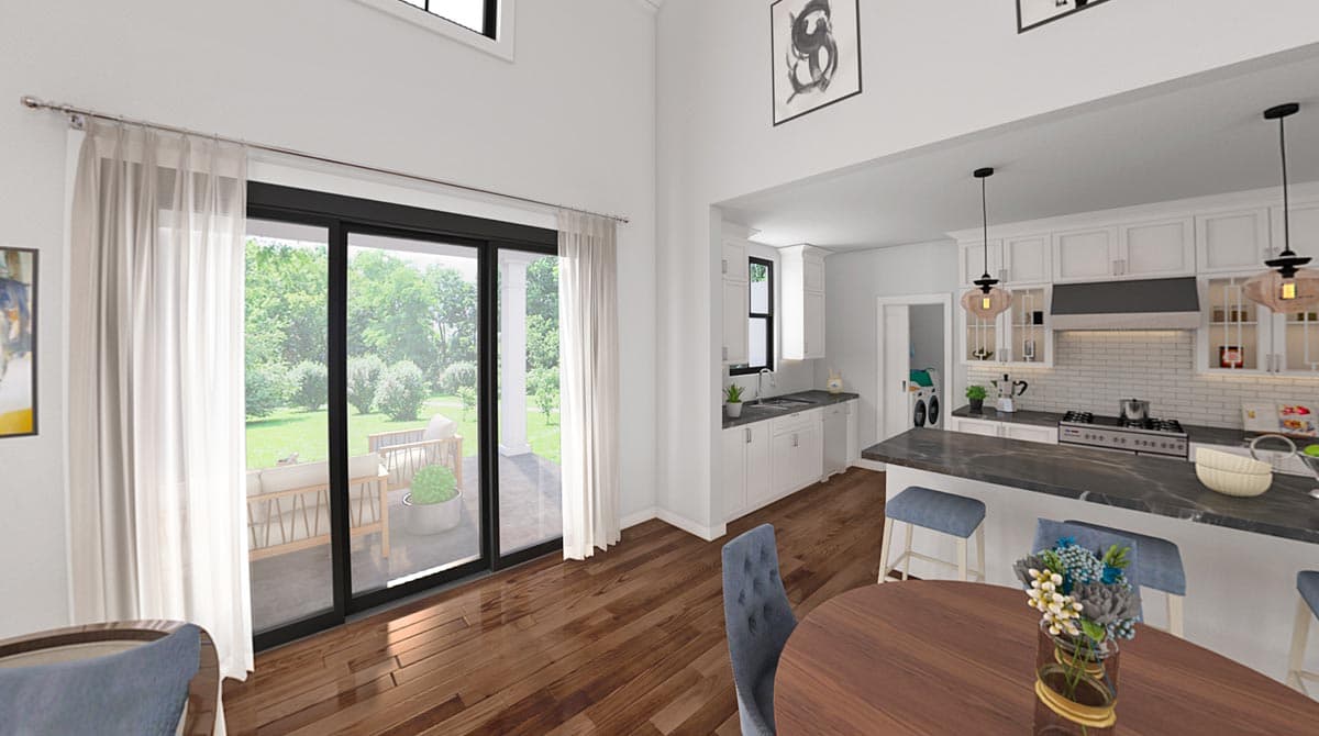 Interior rendering of a modern kitchen and great room with vaulted ceilings, large sliding glass doors, and an island.