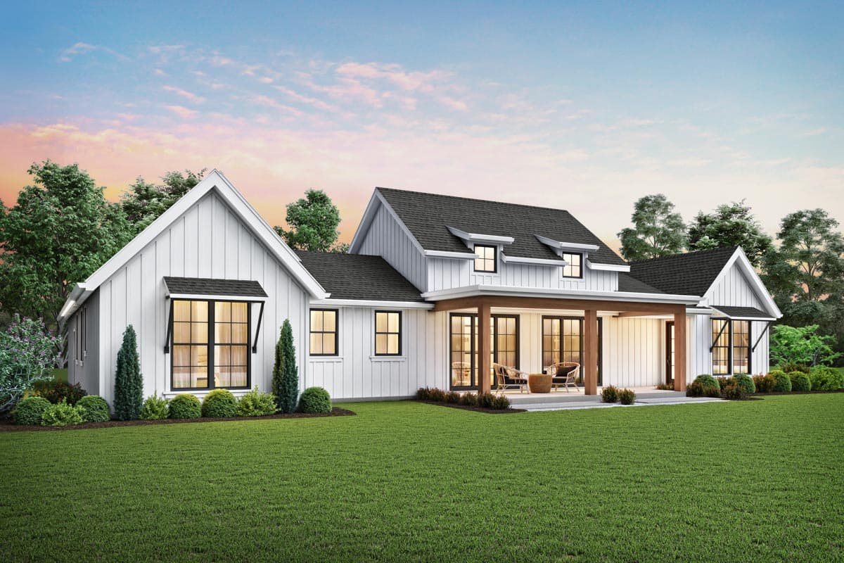 Modern Farmhouse house plan exterior with gables, dormers, and covered porch with wood beams.
