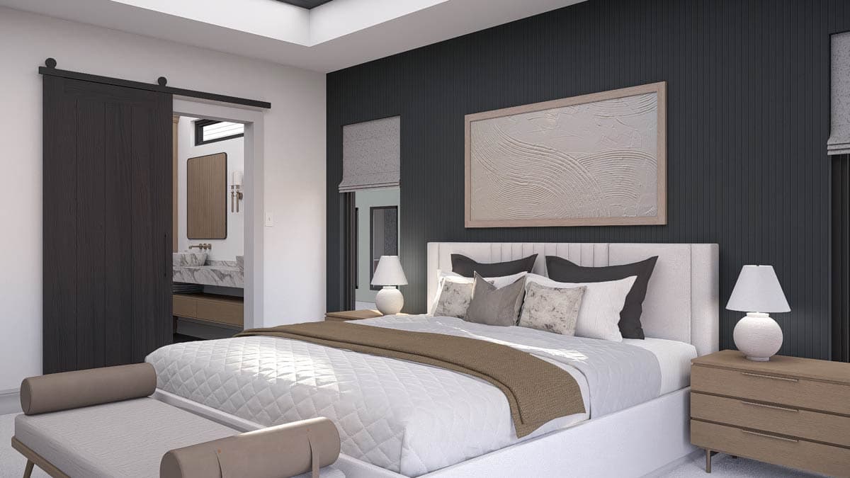 A modern bedroom with a large bed, dark accent wall, and a sliding barn door leading to the bathroom. Soft light fills the space.