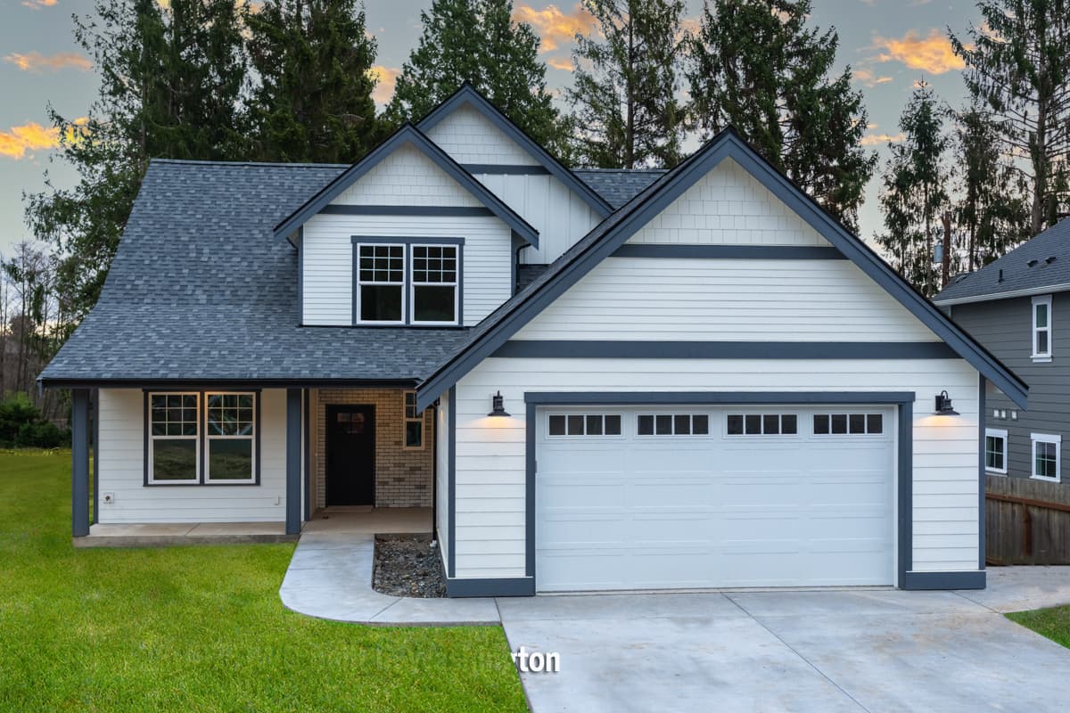 House plan exterior featuring a two-story Modern Farmhouse design. Includes a gable roof, garage, and front porch with brick accents.