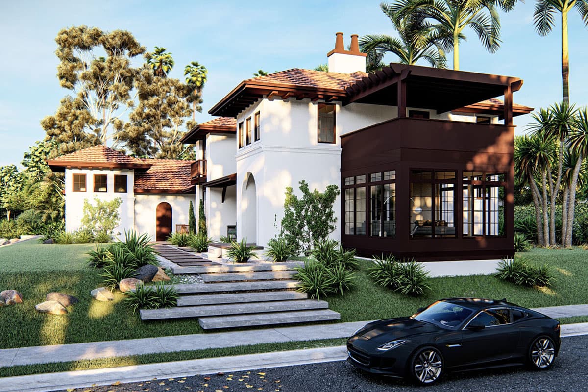 House plan exterior: two-story Mediterranean style with tile roof, arched entryway, and wraparound upper-level balcony.