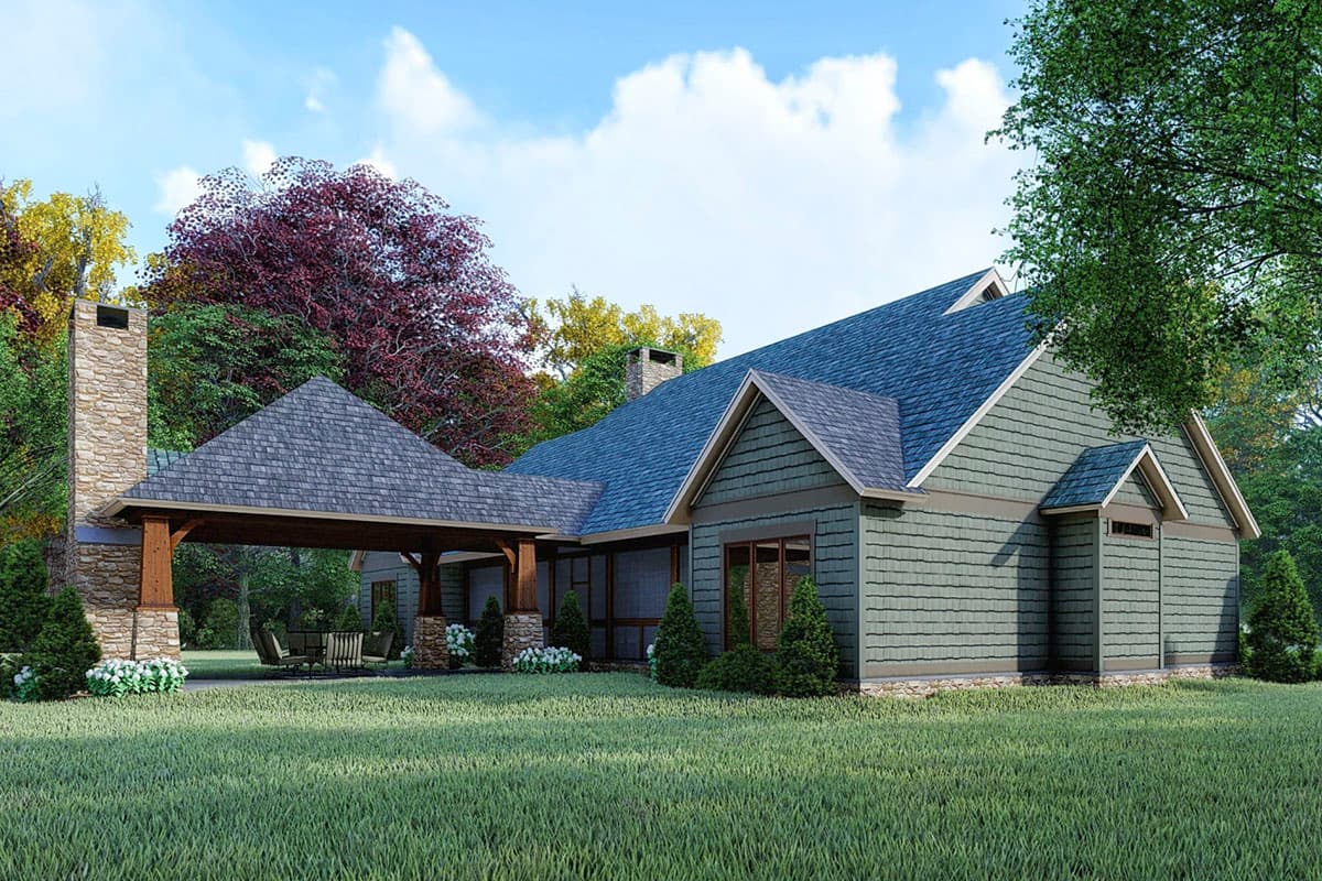 House plan exterior with stone chimney, covered patio, gables, and shingle siding.
