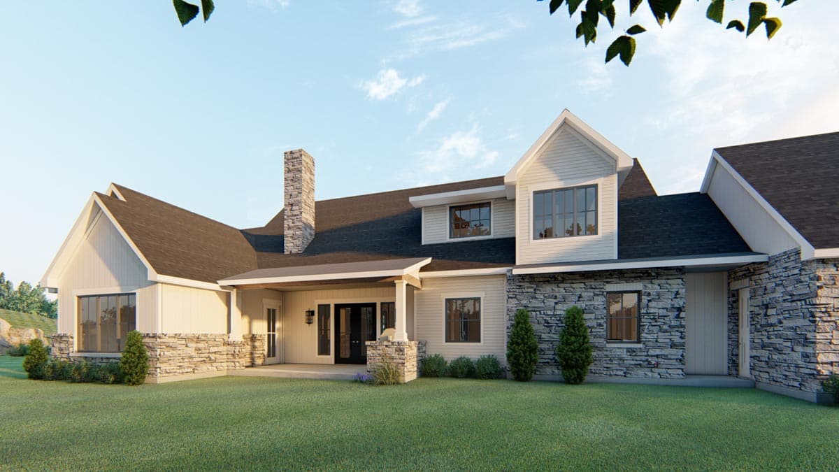 House plan exterior: Modern Farmhouse style, two stories, with stone accents, prominent gables, dormer window, and covered entry.