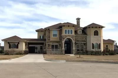 Spacious European House Plan with Two-Story Family Room