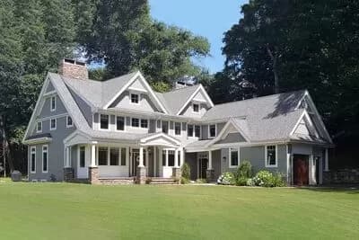 Exclusive Shingled House Plan with 2-Story Great Room