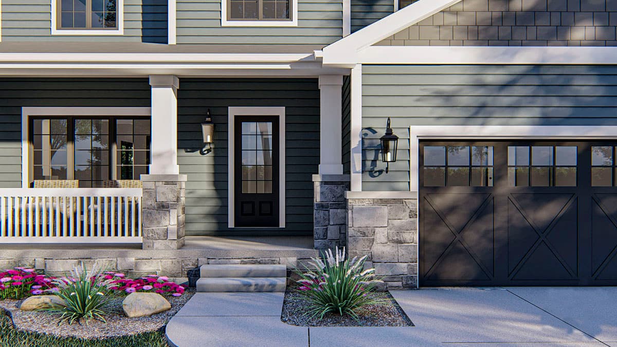House plan exterior: Two-story home with covered porch, stone accents, and a carriage-style garage door.