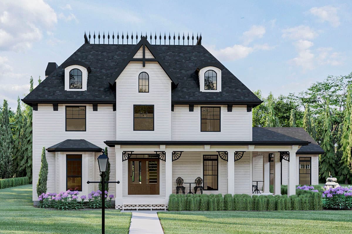 House plan exterior. Two-story farmhouse with a front porch, gabled roof, and dormers. Features include decorative roof finials and bracketed eaves.