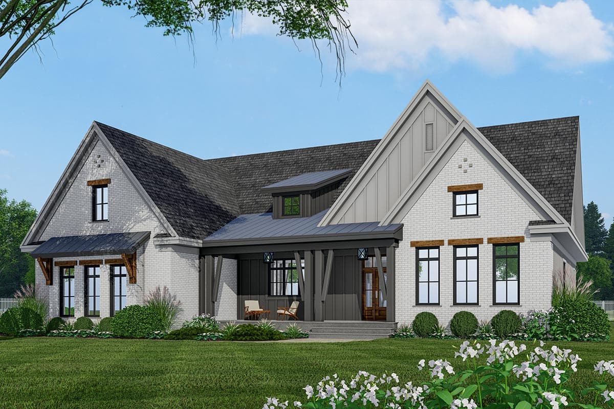 Modern Farmhouse house plan exterior with a covered front porch, gabled dormer, metal roof accents, and white brick.