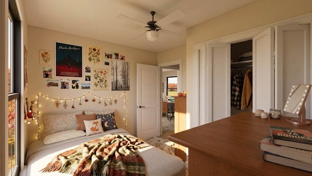 Bedroom with queen bed, string lights, wall decor, ceiling fan, closet, and adjoining office nook visible through doorway.