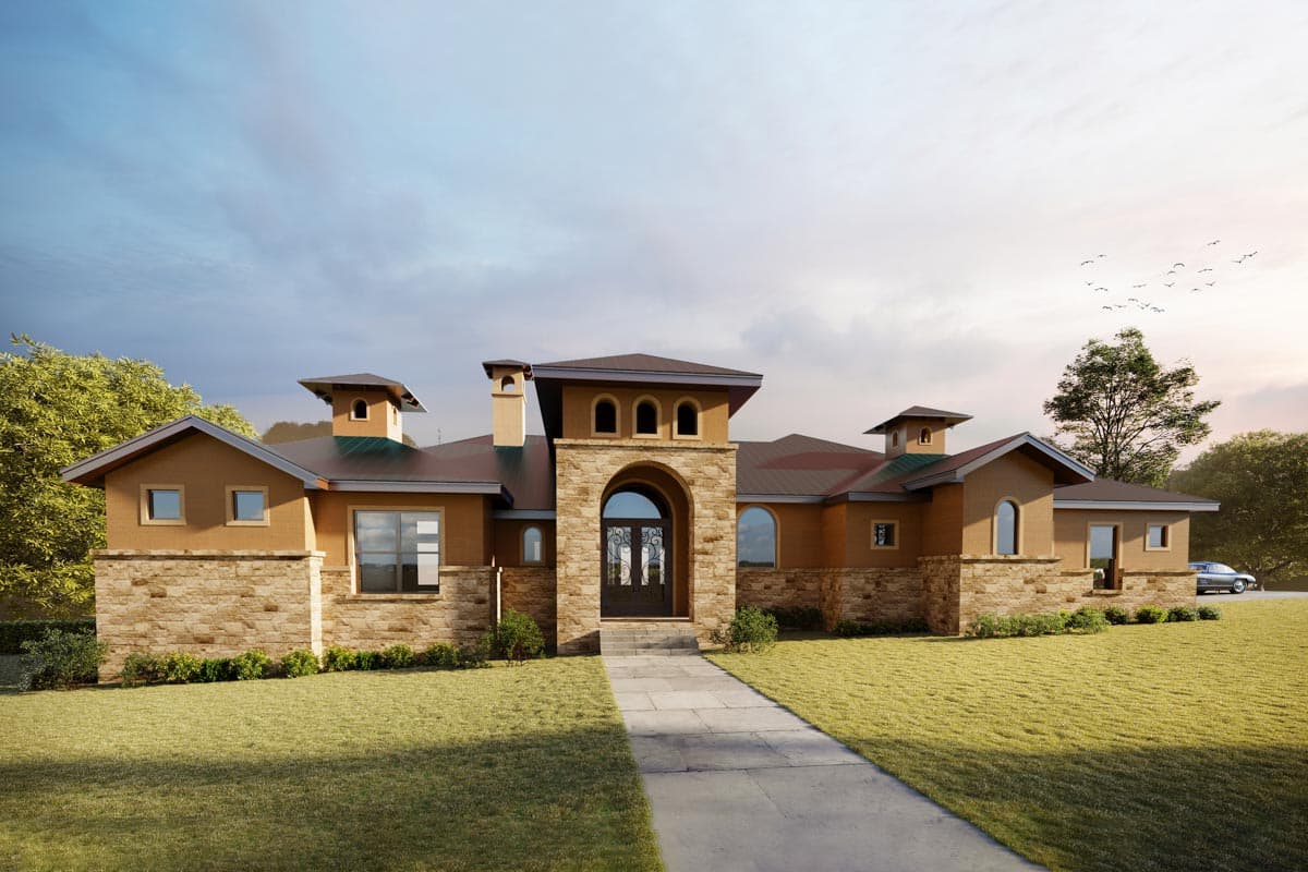 House plan exterior. One-story Mediterranean style with stone facade accents. Features include arched entry, flat roof, and multiple chimneys.