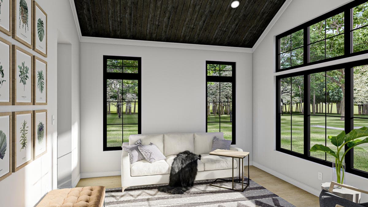 Interior rendering of a living area with a vaulted ceiling, large windows, and a sofa.