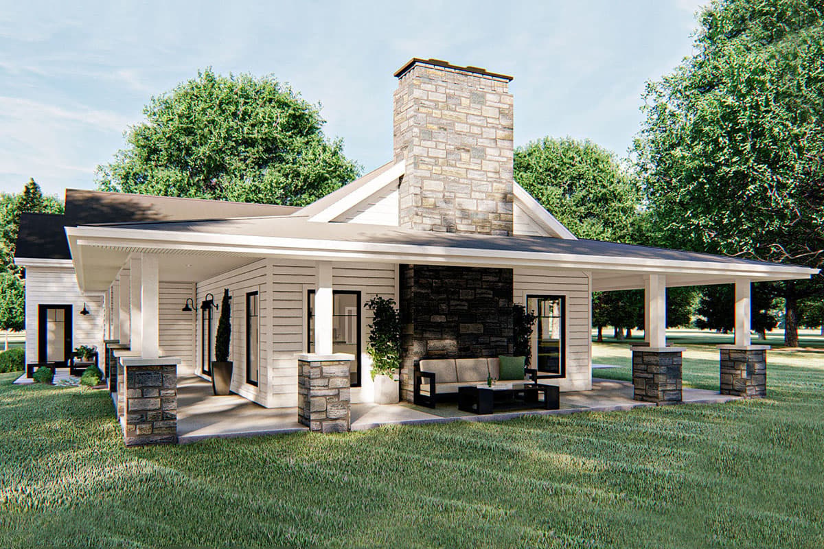 Modern farmhouse house plan exterior with a wide covered porch supported by stone-clad columns and a prominent stone chimney.