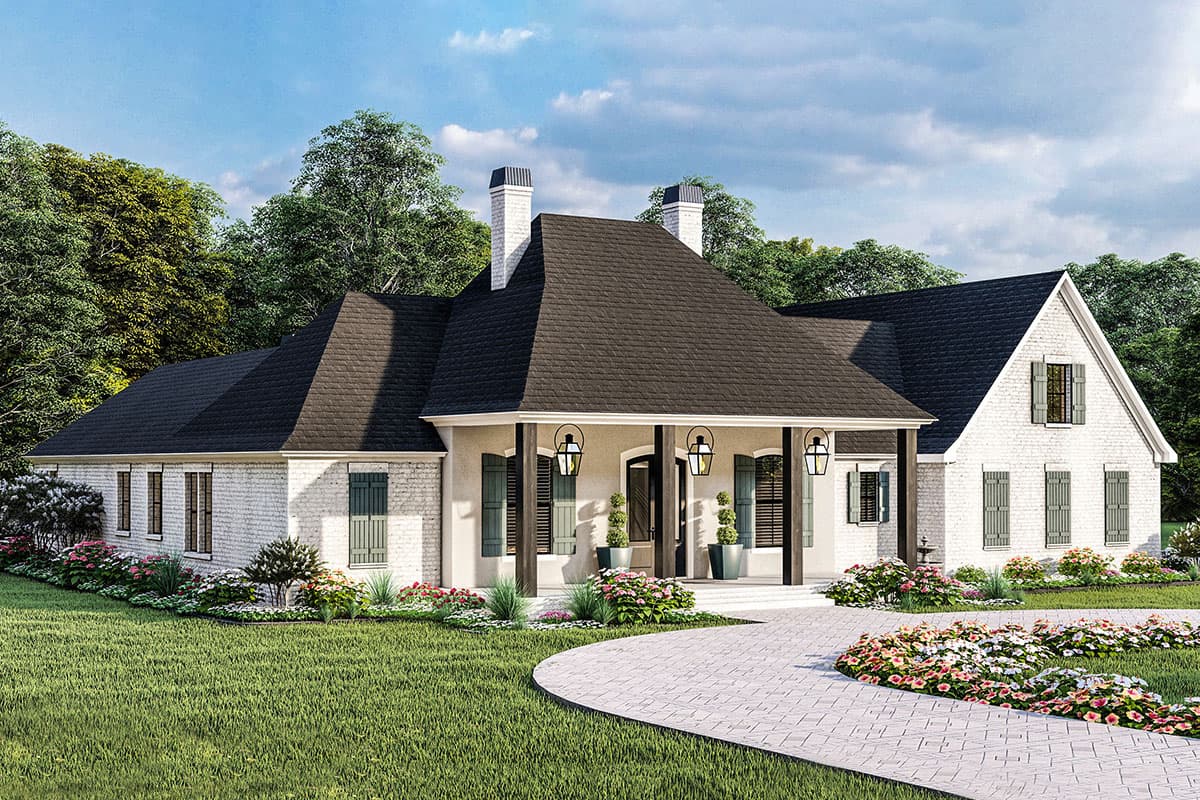 House plan exterior: one-story brick home with a prominent covered porch, dual chimneys, and varied rooflines.