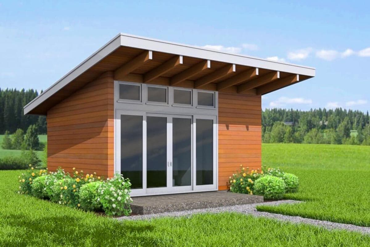 Modern house plan exterior with wood siding, a single story, and a shed roof with exposed rafters over sliding glass doors.