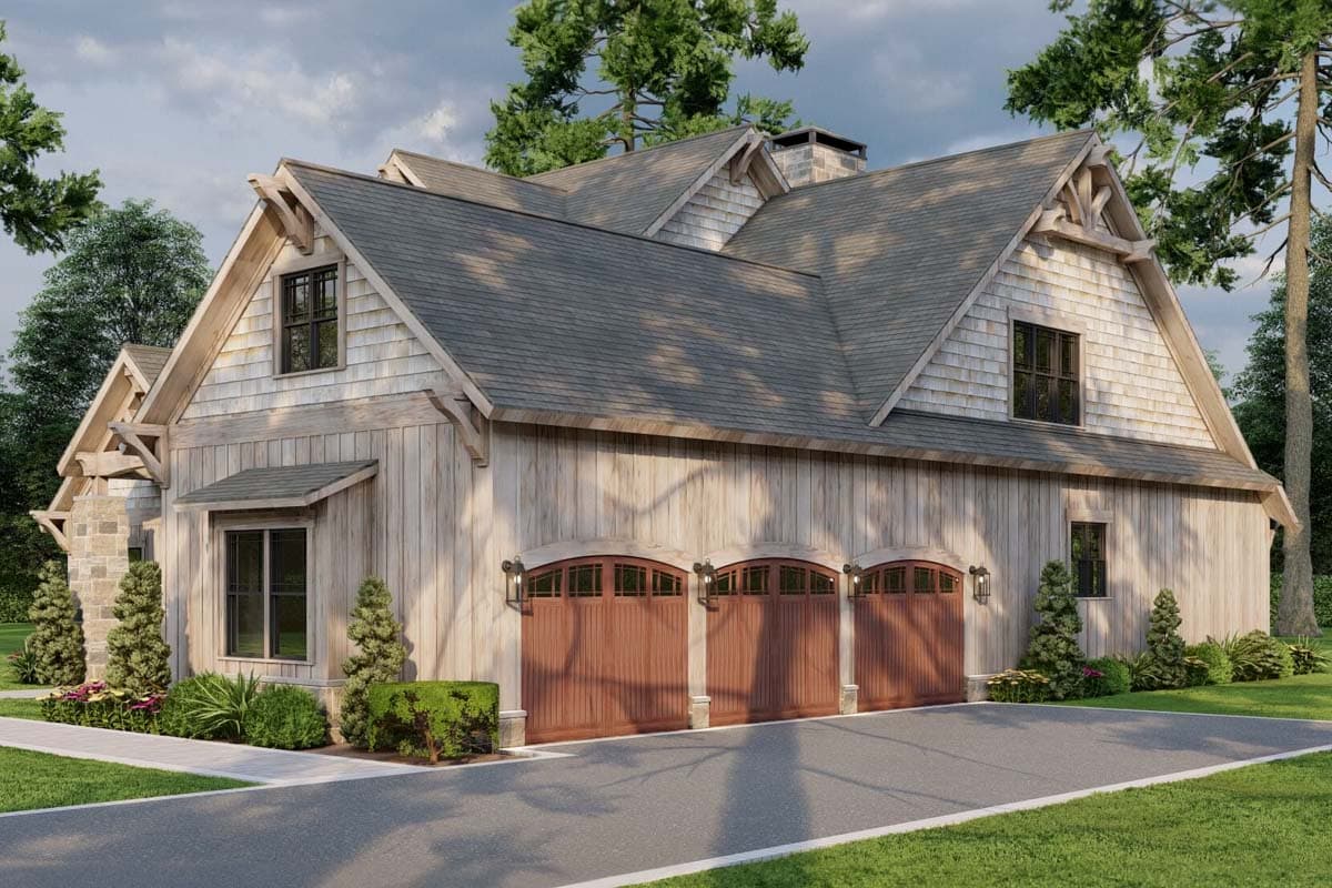 House plan exterior with natural wood siding, stone accents, three arched garage doors, and prominent gables with decorative brackets.