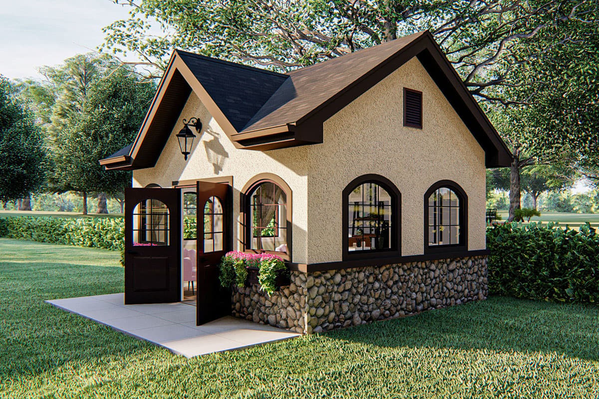 House plan exterior: One-story building with stone foundation, arched windows, double doors, and a steeply pitched roof.