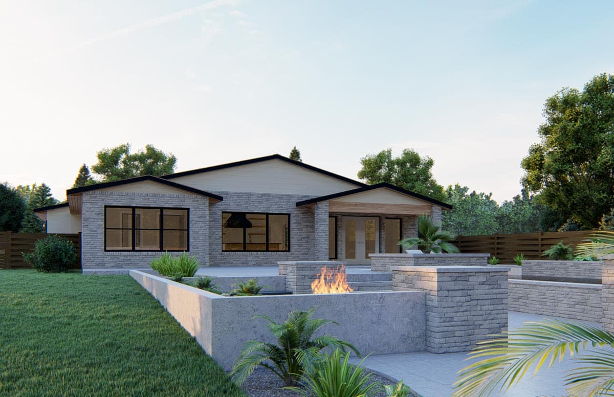 Modern Ranch house plan exterior with stone facade, wide windows, low-pitched gable roofs, and an integrated outdoor fireplace.