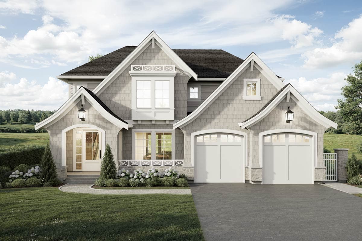 A two-story house with a grey exterior, white trim, and a black roof. The home features a green lawn, two garage doors, and a decorative front porch.