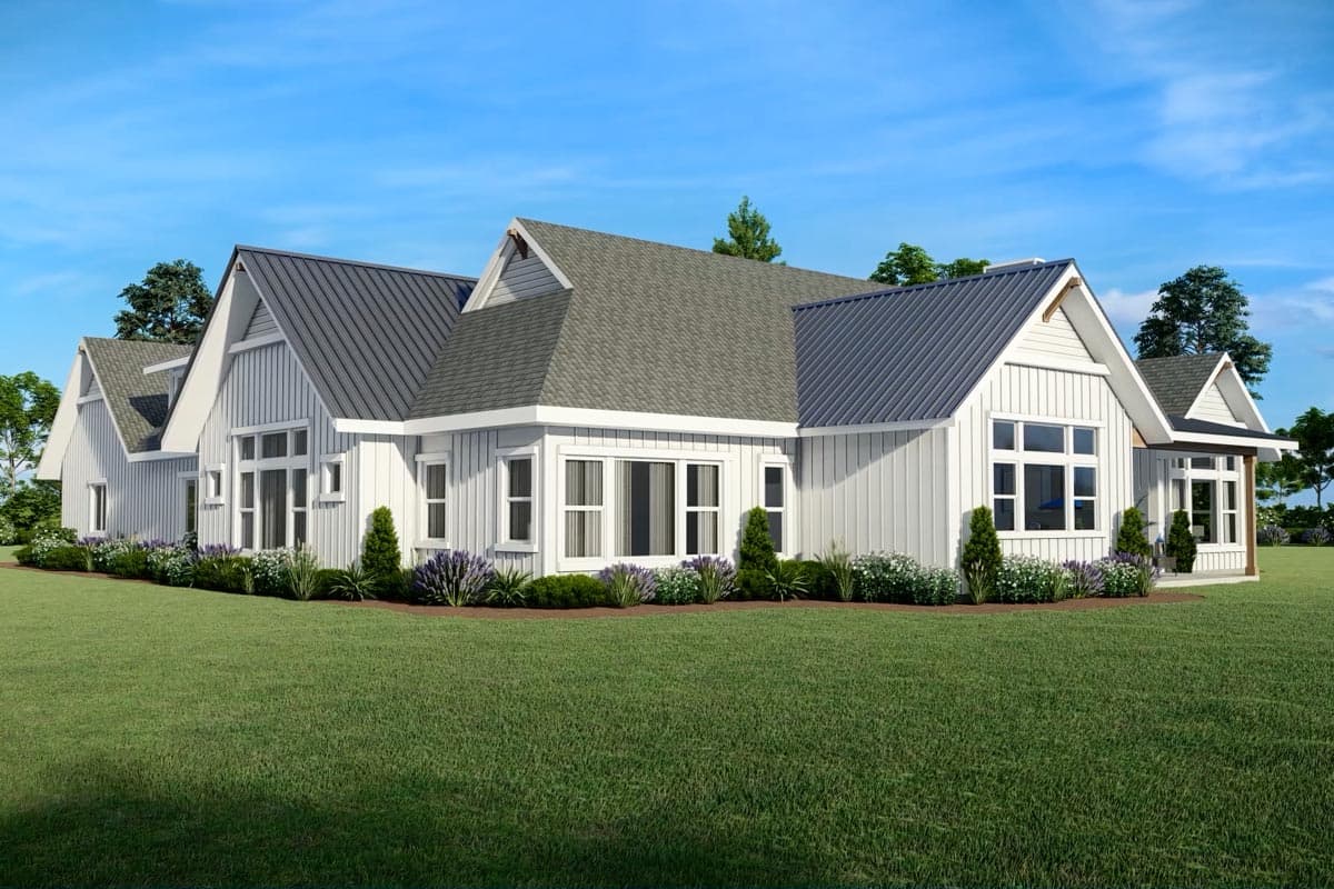 Modern Farmhouse house plan exterior, one story, white board and batten siding, gable rooflines, and large windows.