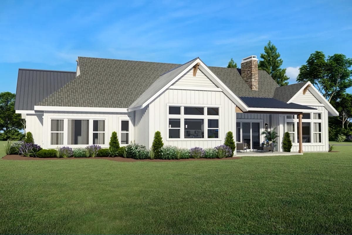 House plan exterior: Modern Farmhouse style, one story, white siding, gable roof, metal roof section, stone chimney, covered patio.