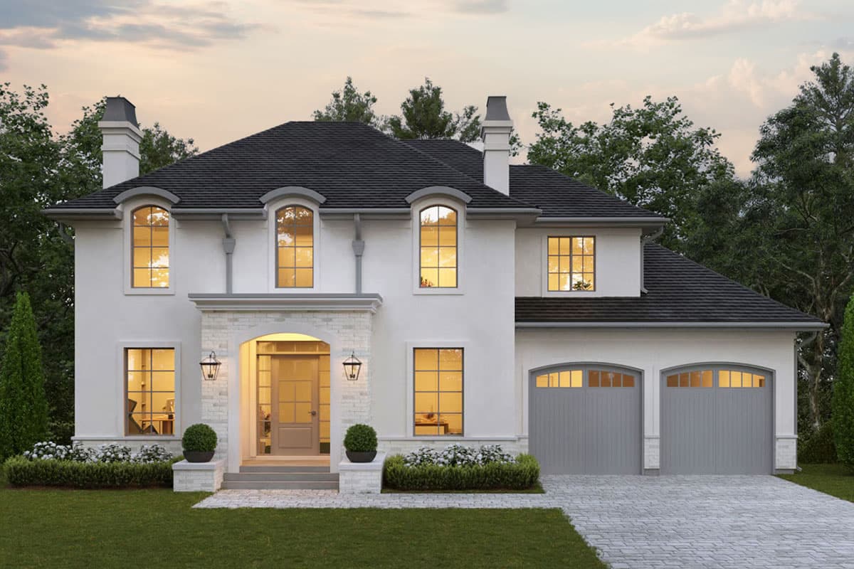 House plan exterior featuring a two-story design with arched windows, a covered entry, and a two-car garage with arched garage doors.