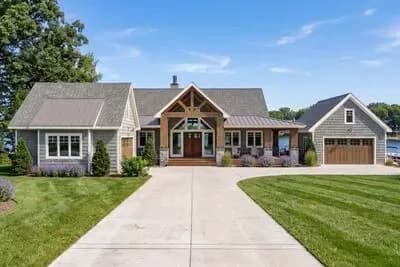 Lake House with Massive Wraparound Covered Deck