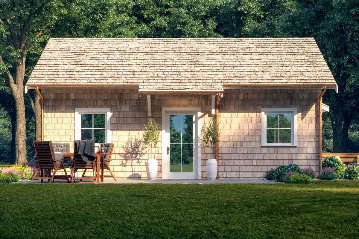 House plan exterior: Single-story home with cedar shingles, pitched roof, double-hung windows, and a central glass door.