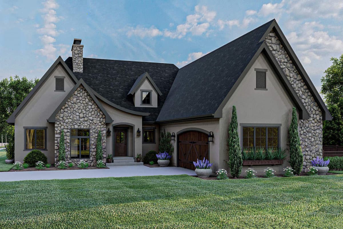 House plan exterior: Two-story European-style home with stone accents, gables, dormers, and an arched garage door.