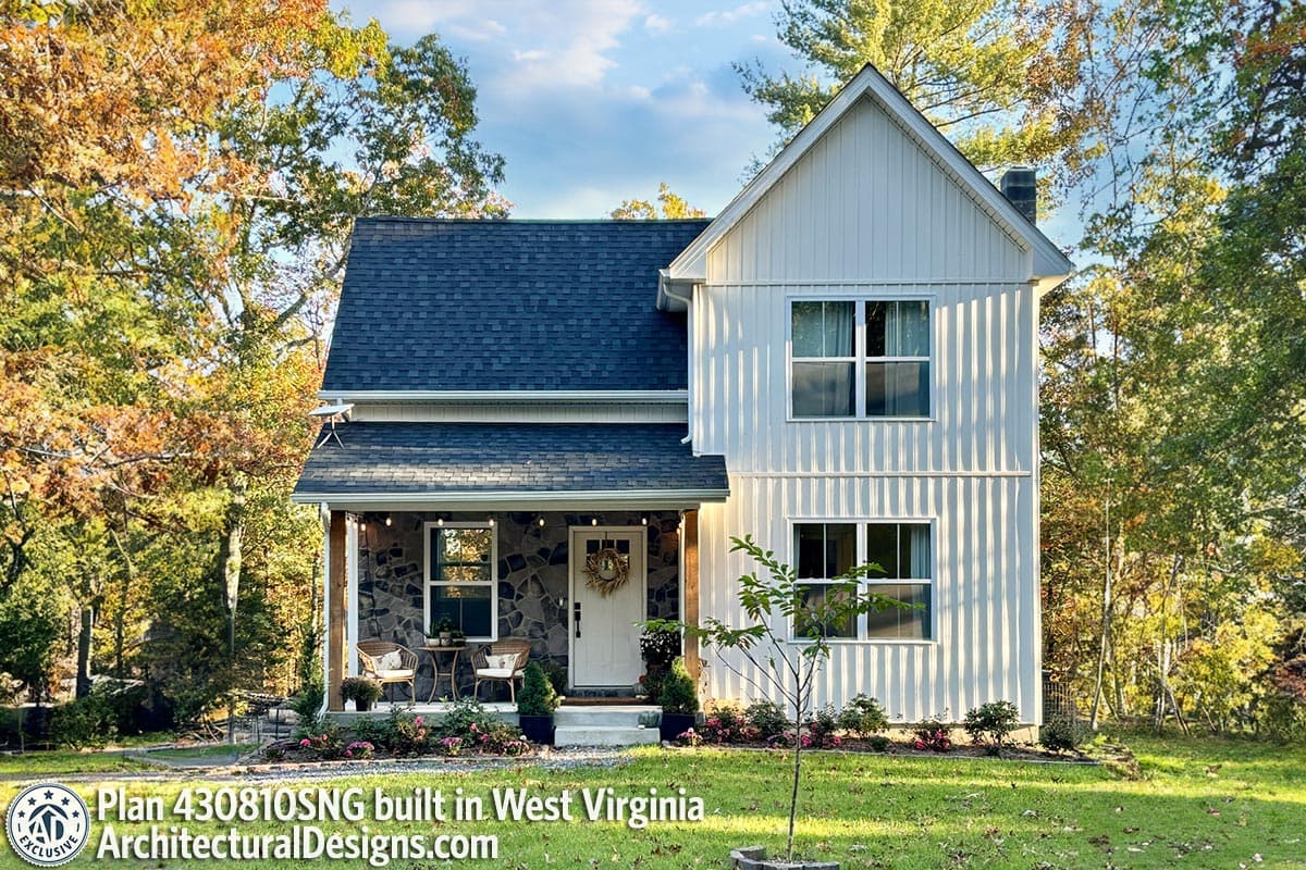 House plan exterior: two-story Modern Farmhouse with stone-clad covered porch, gables, and board-and-batten siding.