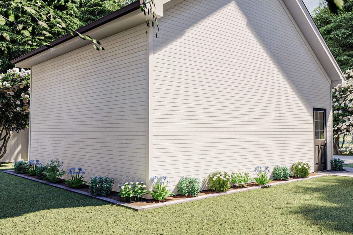 House plan exterior, clapboard siding, gabled roof, and a single door with a transom window.
