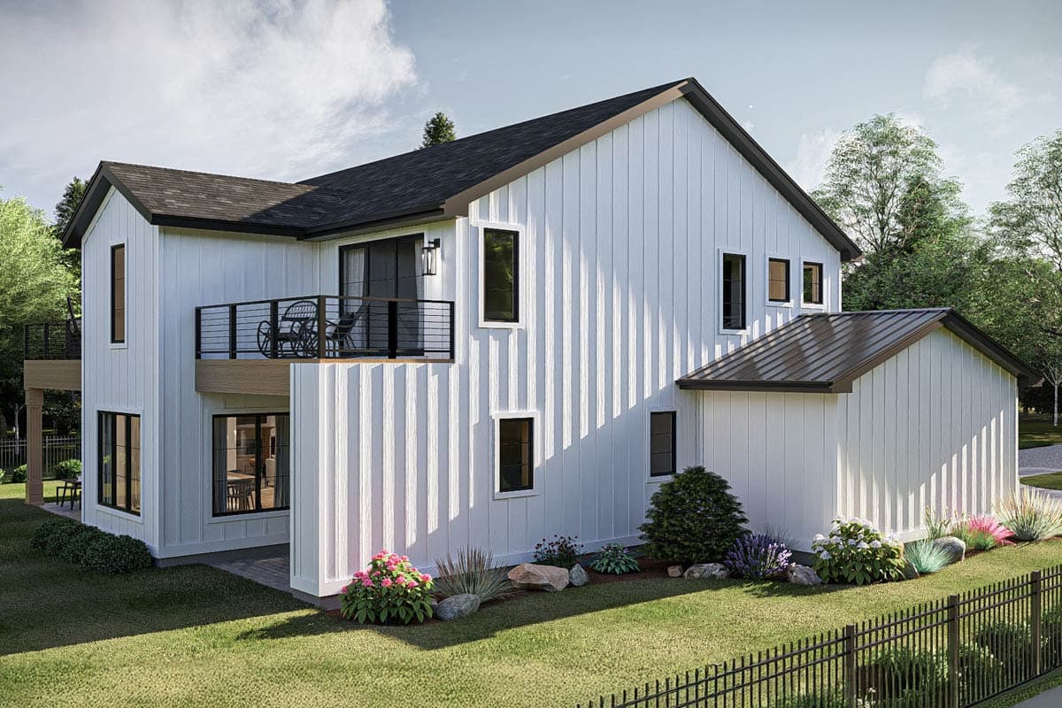 Modern Farmhouse house plan exterior: two stories, vertical siding, prominent gables, and upper-level balcony.