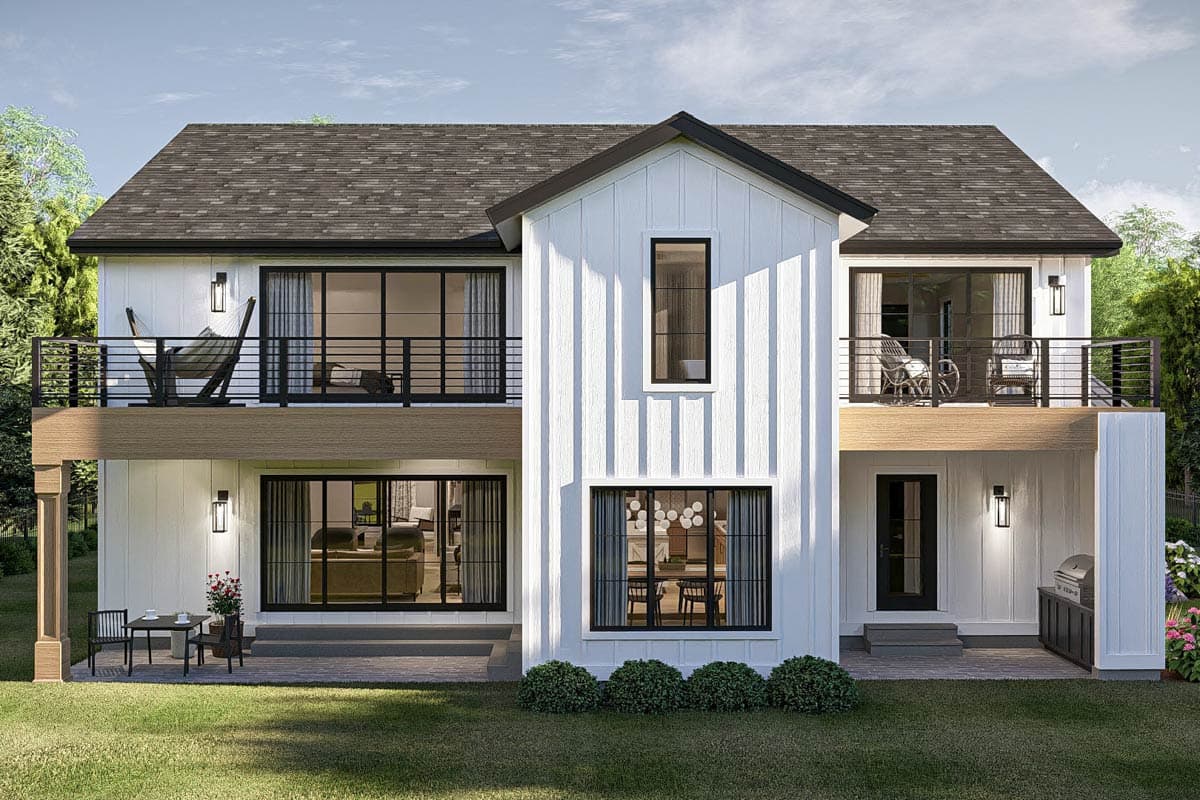 Modern farmhouse house plan exterior with two stories, board and batten siding, balconies, and large windows.