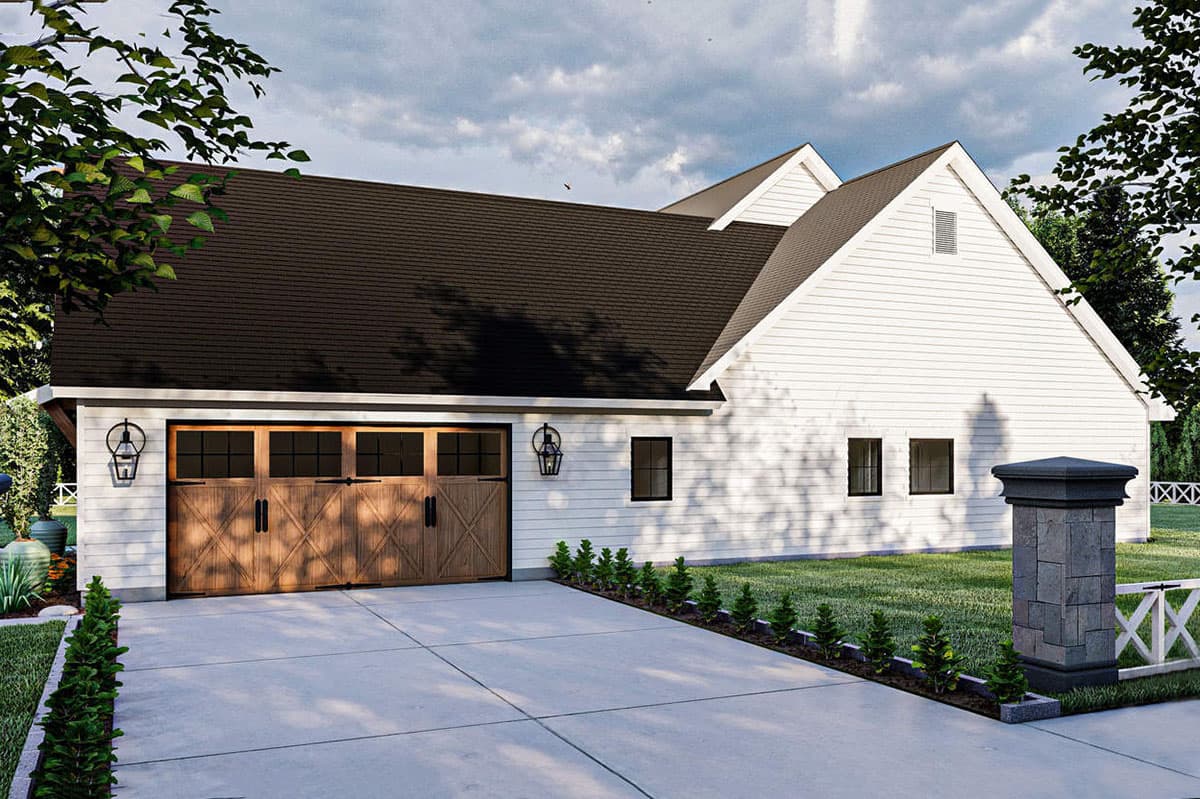 House plan exterior: Modern Farmhouse style, two-car garage with wood doors, gable rooflines, and white siding.