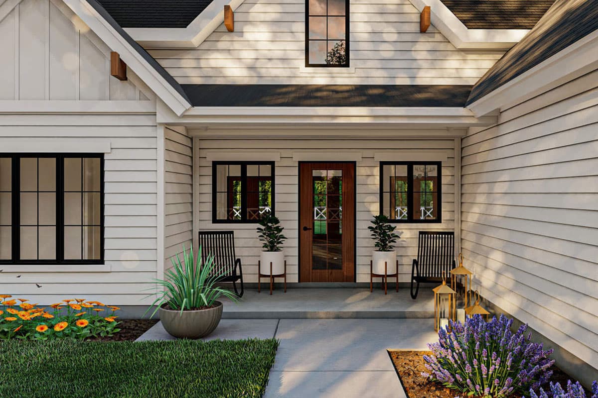Modern Farmhouse house plan exterior with board and batten siding, black-trimmed windows, and a covered porch with a wood door.