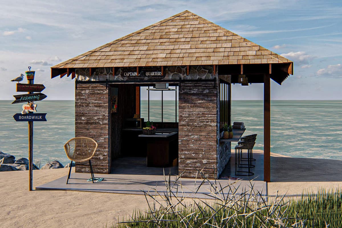 House plan exterior featuring a rustic cabin with stone and wood siding, open bar area, and shingled hip roof.