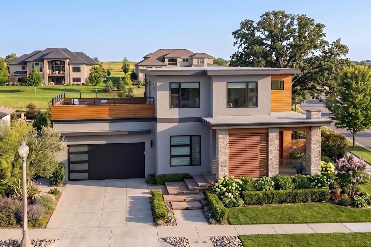 Modern house plan exterior with flat roof, stucco finish, wood accents, stone columns, and attached garage.