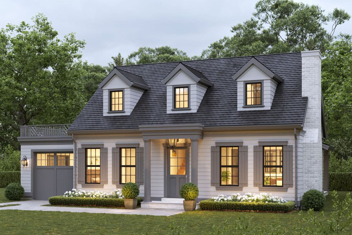 House plan exterior. Two-story home with a gabled roof, three dormers, and a detached garage. Features a brick chimney and front porch.