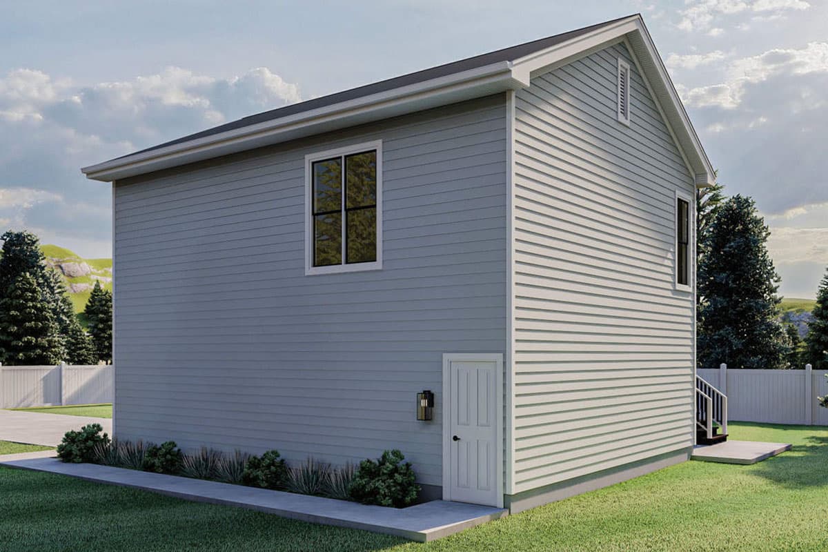 House plan exterior of a two-story building with vinyl siding, a gable roof, and two windows.