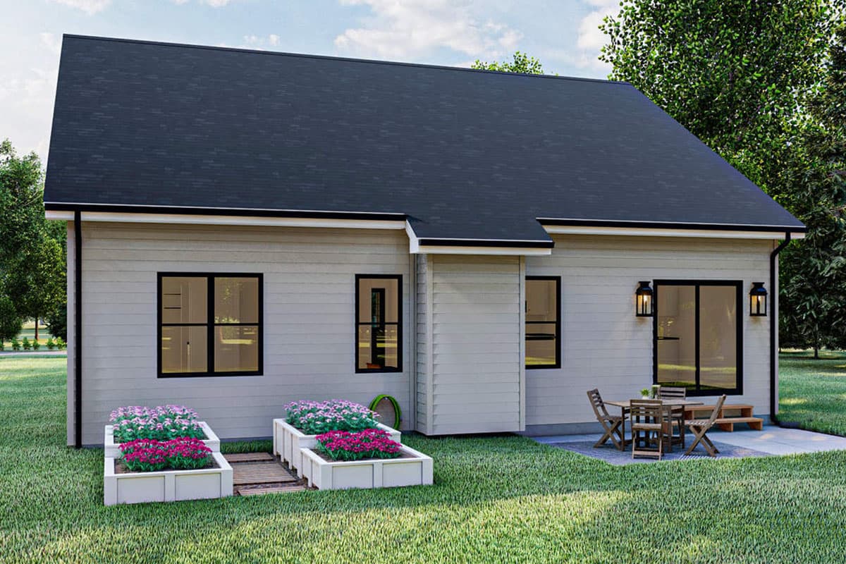 House plan exterior view of a one-story home with horizontal siding, a dark pitched roof, and multiple windows.
