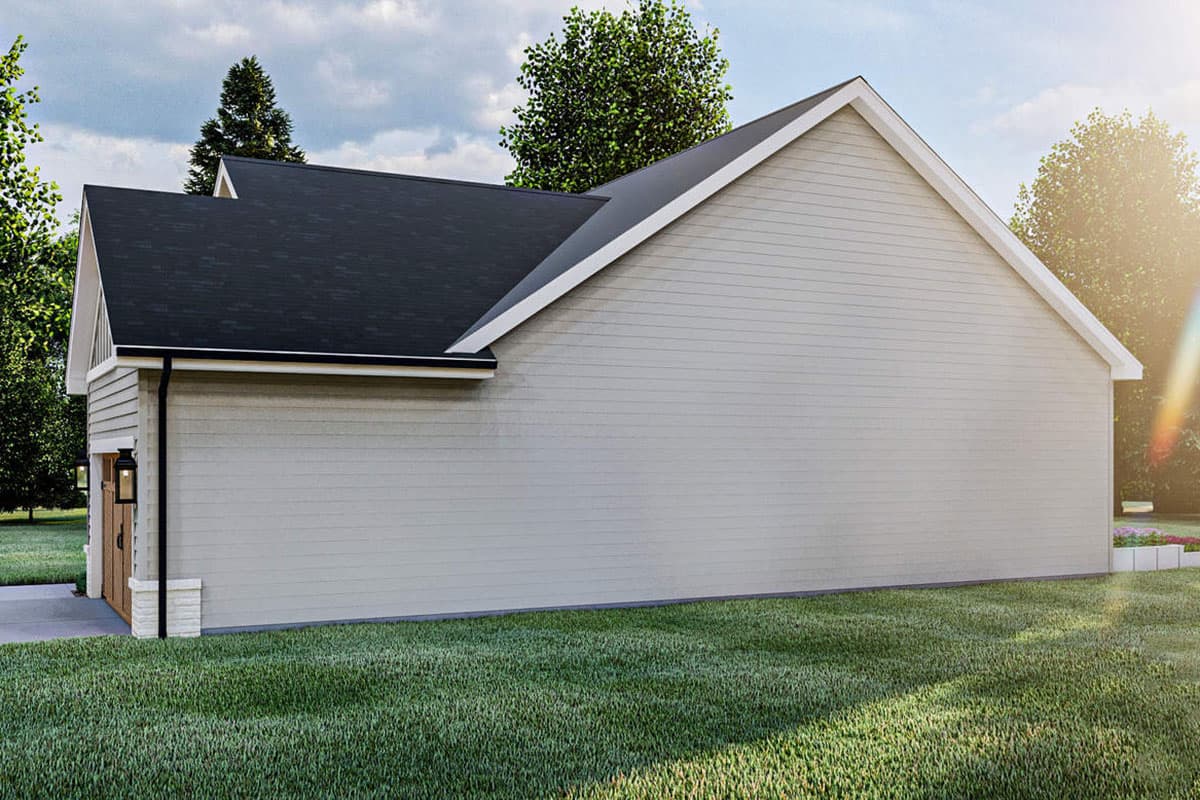 House plan exterior: Gable roof, siding, and visible garage door.
