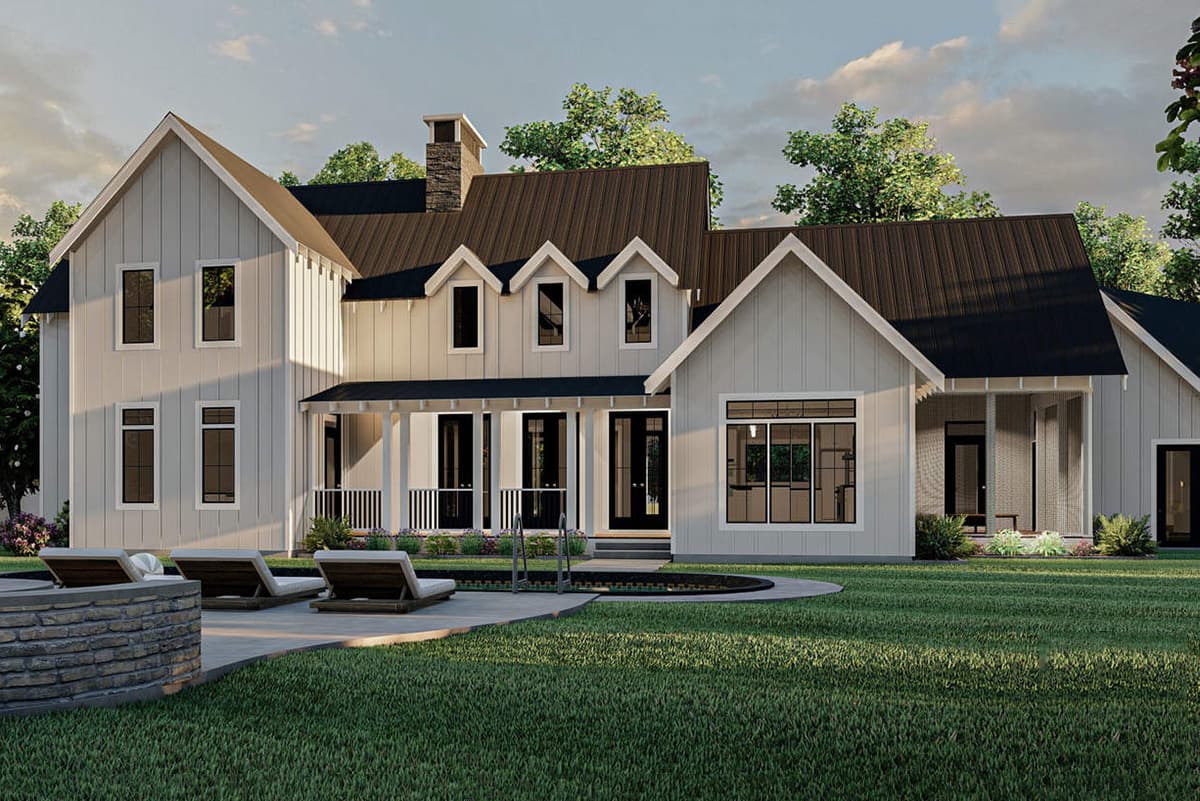 House plan exterior: Modern Farmhouse style, two stories, metal roof, gables, dormers, and covered porch with stone chimney.