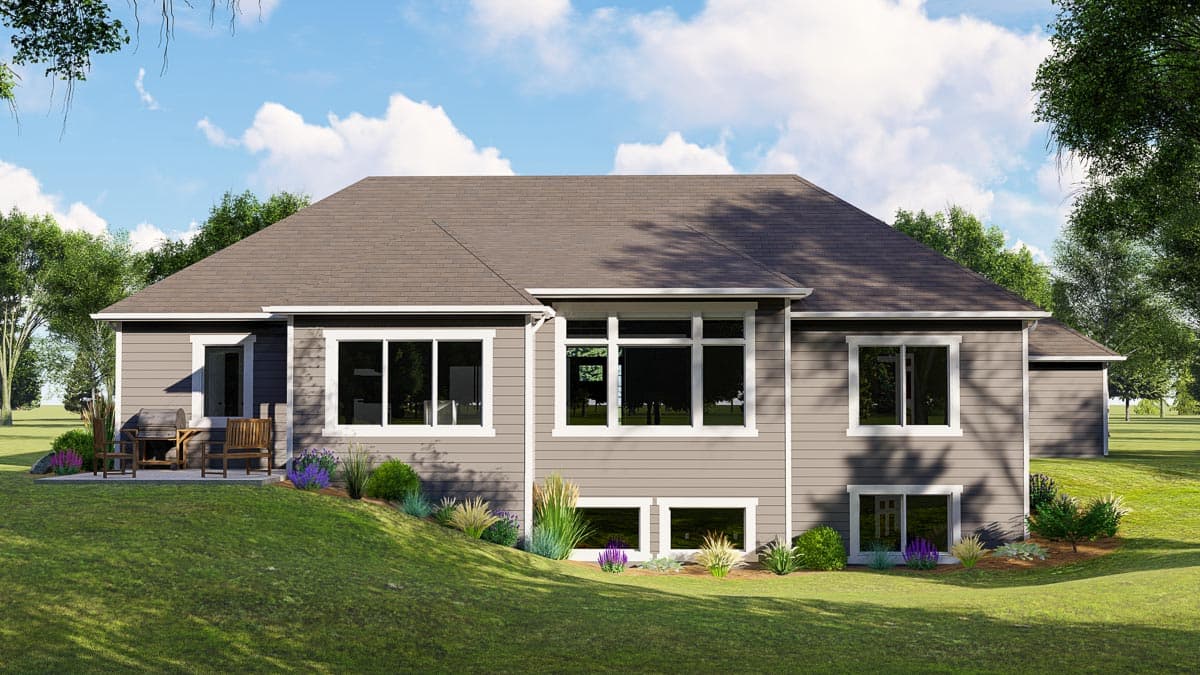 House plan exterior: Ranch-style, two-story home with a large rear patio, ample windows, and a pitched roof.