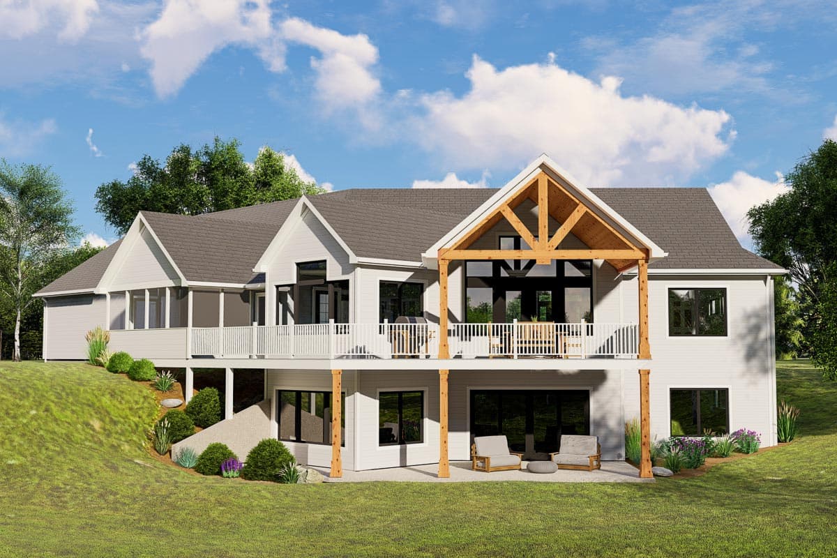 Modern Farmhouse house plan exterior with covered deck, exposed wooden beams, multiple gables, and walk-out lower level.